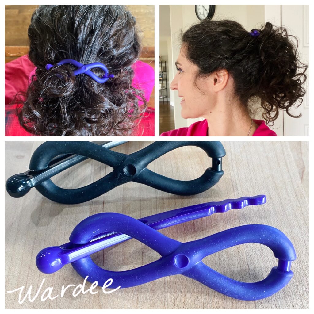 shot of a woman with dark curly hair using a non-damaging hair clip 2