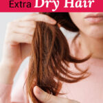 A brunette woman holds up her hair to show the dry ends. Text overlay says: "4 Ways to Moisturize Extra Dry Hair (help for coarse, curly, damaged or frizzy hair!)"