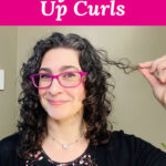 Woman holding up a curl that didn't dry quite right. Text overlay says: "How to QUICKLY Re-Style Messed Up Curls (in 5 minutes or less!)"