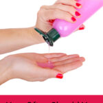 A woman squeezing shampoo into the palm of her hand. Text overlay says: "How Often Should You Wash Your Hair? (for happy, healthy hair!)"