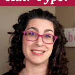 Photo of a woman with curly hair, wearing pink glasses. Text overlay says: "What Is Your Hair Type? (structure, density, porosity, curl type!)"